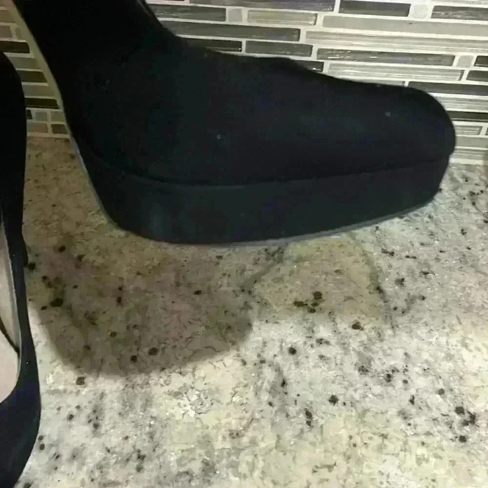 Michael Kors, Black Suede Size 9, pre-owned .75” platform with a 5” heel Sexy!